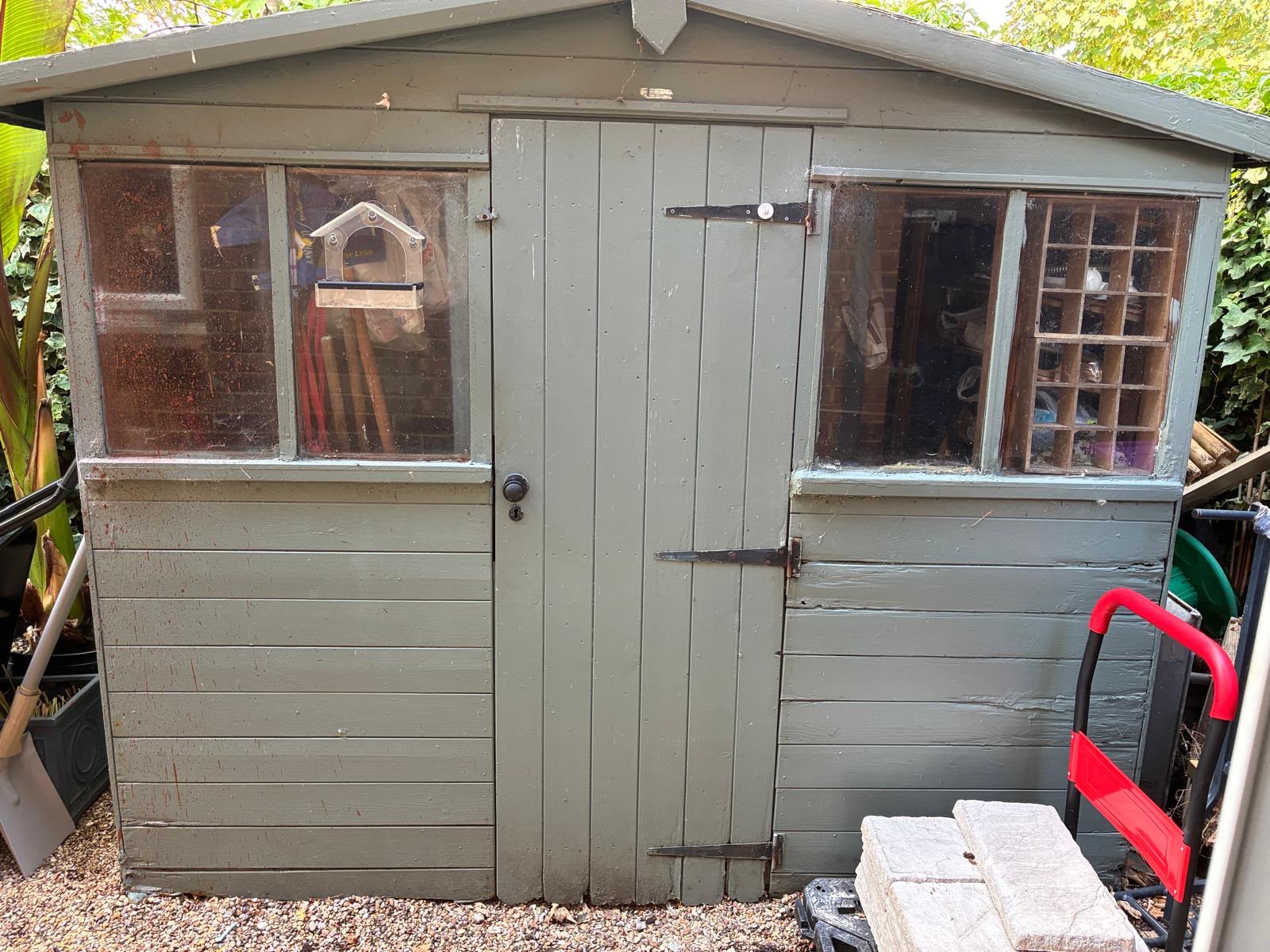 Timber garden outbuilding ready for dismantling and removal by EDW in Essex
